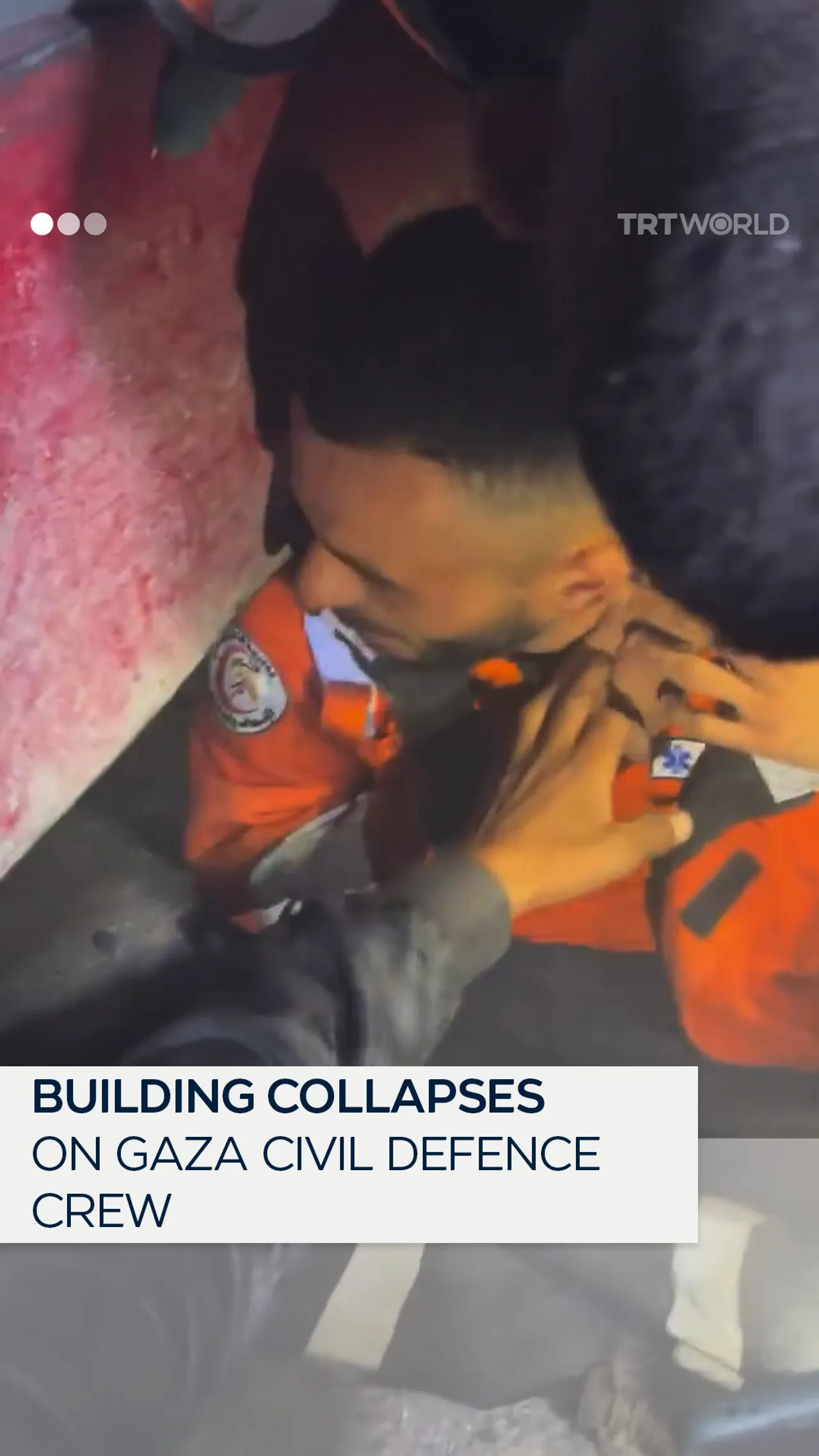Gaza Civil Defence escape collapsing building during rescue attempt